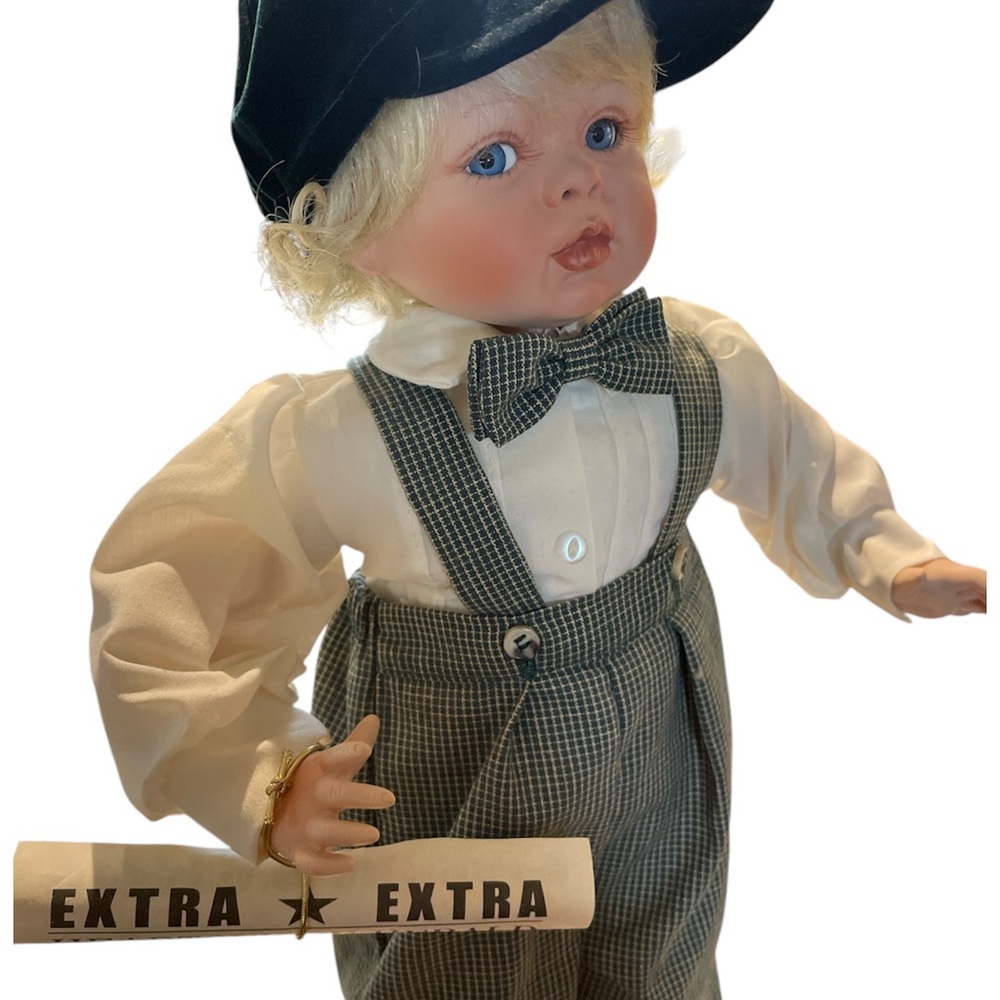Fayzah Spanos Annual Edition porcelain Doll with Blonde Hair and plaid Outfit.